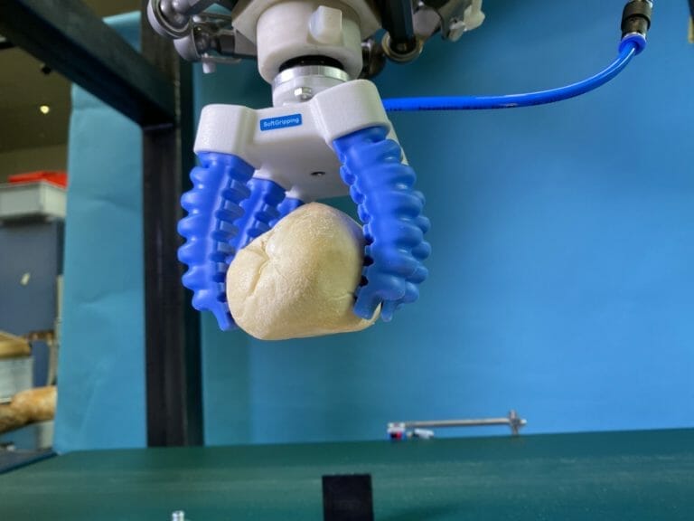 A single bread bun in 4 jaw gripper