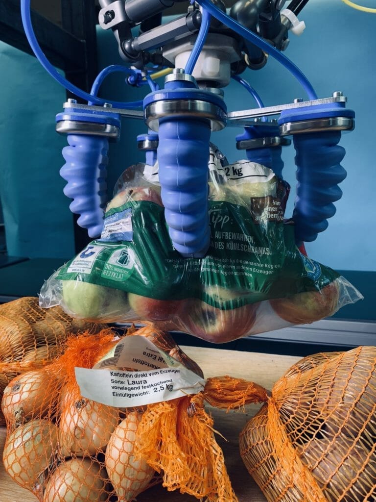 Bag of apples handled by GorillaFinger robot grippers